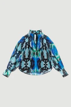 Karen Millen Petite Mirrored Kaleidoscope Woven Blouse 9 Karen Millen Petite Mirrored Kaleidoscope Woven Blouse -Karen Millen shop blue petite mirrored kaleidoscope woven blouse 2