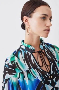 Karen Millen Petite Mirrored Kaleidoscope Woven Blouse 10 Karen Millen Petite Mirrored Kaleidoscope Woven Blouse -Karen Millen shop blue petite mirrored kaleidoscope woven blouse 3