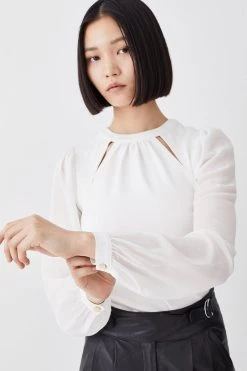 Karen Millen Georgette Sleeve Cut Out Ponte Jersey Top 8 Karen Millen Georgette Sleeve Cut Out Ponte Jersey Top -Karen Millen shop cream georgette sleeve cut out ponte jersey top 1
