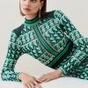 Karen Millen Geo Jacquard Knit Dress With Pleated Midi Skirt 1 Karen Millen Geo Jacquard Knit Dress With Pleated Midi Skirt -Karen Millen shop green geo jacquard knit dress with pleated midi skirt