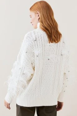 Karen Millen Lydia Millen Feather Embellished Chunky Cable Knit Jumper 9 Karen Millen Lydia Millen Feather Embellished Chunky Cable Knit Jumper -Karen Millen shop ivory lydia millen feather embellished chunky cable knit jumper 1 2