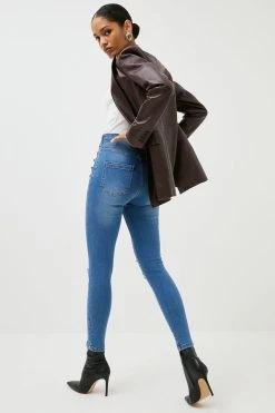 Karen Millen High Rise Skinny Ripped Button Detail Jeans -Karen Millen shop mid wash high rise skinny ripped button detail jeans 3