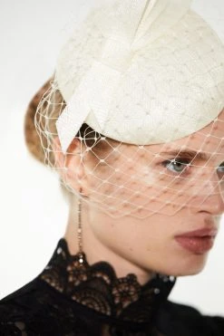 Karen Millen Emily-London Asymmetric Veiled Fascinator -Karen Millen shop navy emily london asymmetric veiled fascinator 1 2