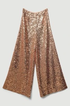 Karen Millen Lydia Millen Textured Sequin Wide Leg Woven Trousers 11 Karen Millen Lydia Millen Textured Sequin Wide Leg Woven Trousers -Karen Millen shop rose gold lydia millen textured sequin wide leg woven trousers 4